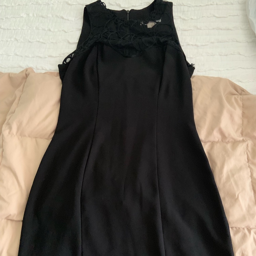 Black sheath dress with lace detail